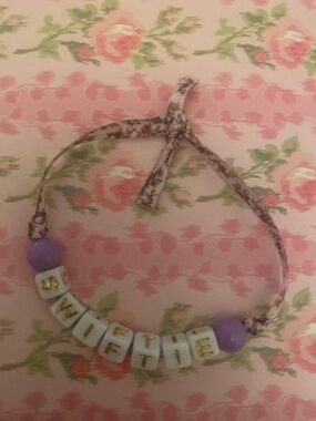 Swiftie tie bracelet made with LoveShackFancy ribbon